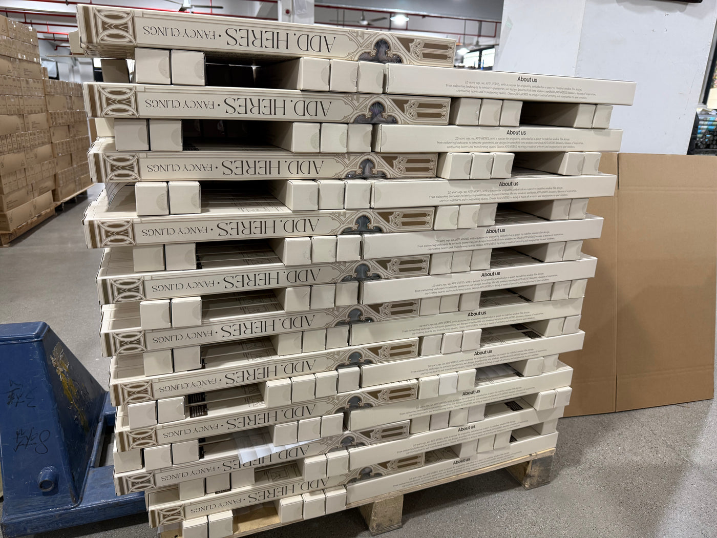 Cartons of finished film stacked and strapped on a pallet ready for export