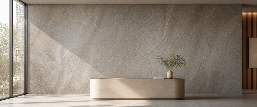 Flexible stone sheet covering a full feature wall behind a low console