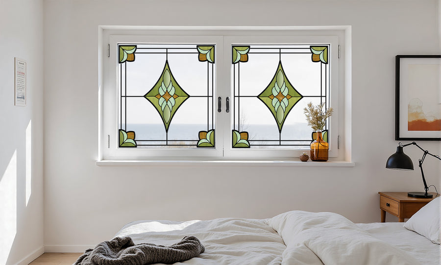 Modern leaded stained glass window film in colored blocks above a window seat